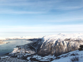 Scenic view of snowcapped mountains against sky