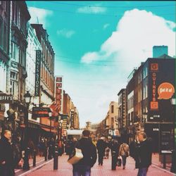 People walking on city street