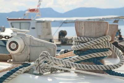 Close-up of nautical vessel on sea against sky