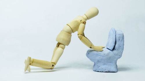 Close-up of stuffed toy against white background