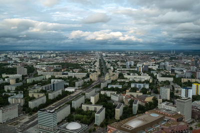 High angle view of buildings in city against sky