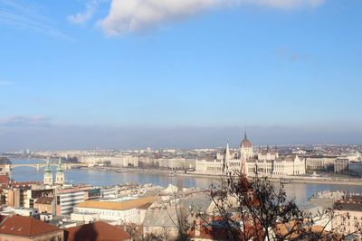 View of river with buildings in background