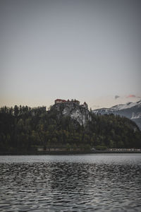 Scenic view of lake with mountains in background