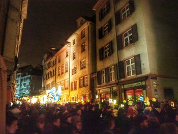 Illuminated buildings in city at night