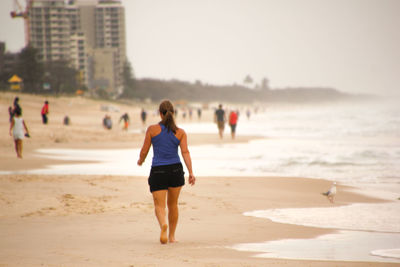 People walking on beach