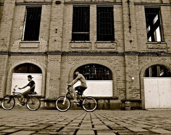 Bicycle parked in front of building
