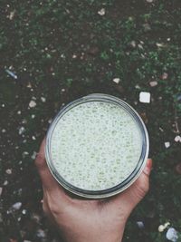 Close-up of hand holding drink