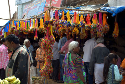 Rear view of people in traditional clothing