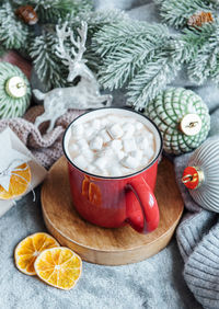 Cozy winter and christmas setting with hot cocoa and homemade cookies