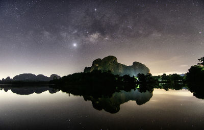 Milky way, ban nong thale, scenic view of lake against sky at night