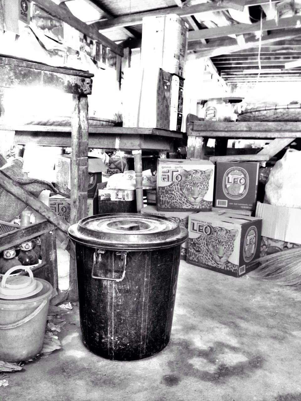 indoors, container, table, still life, metal, built structure, no people, food and drink, architecture, old, day, arrangement, drink, large group of objects, close-up, group of objects, wood - material, stack, jar