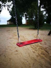 Close-up of swing in playground