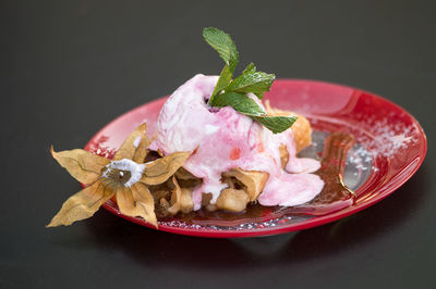 Close-up of food in plate on table. desert with ice cream and apple pie 