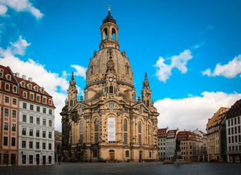 Low angle view of buildings against sky in city
