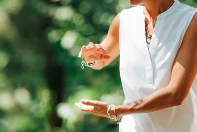 Qigong female master practicing chinese martial arts in nature