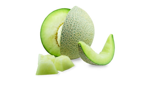 Close-up of fruit against white background