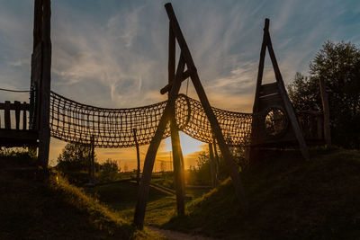 View of playground against sky during sunset