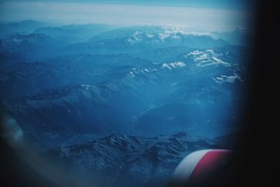 Scenic view of snow covered mountains