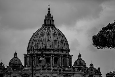 St. peter's basilica dome against sky in city