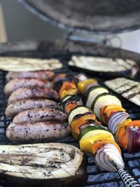 High angle view of sausages on barbecue