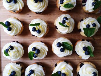 Directly above shot of cupcakes on table