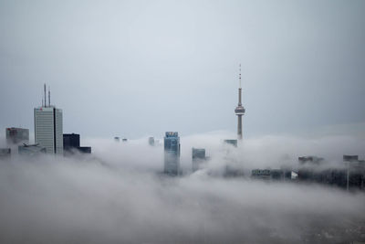 View of buildings in city during winter