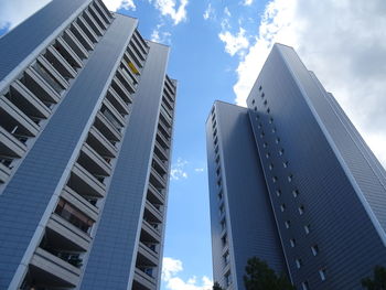 Low angle view of modern buildings against sky