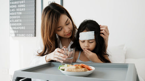 Portrait of mother and daughter