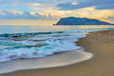 Scenic view of sea against sky during sunset