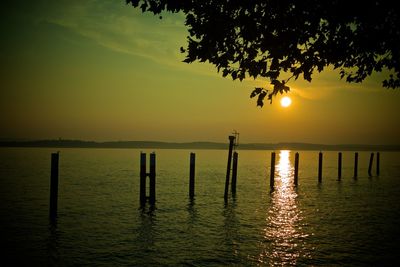 Scenic view of sunset over lake