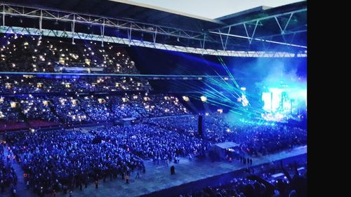 Crowd at music concert at night