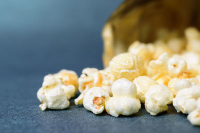 Close-up of popcorns on table