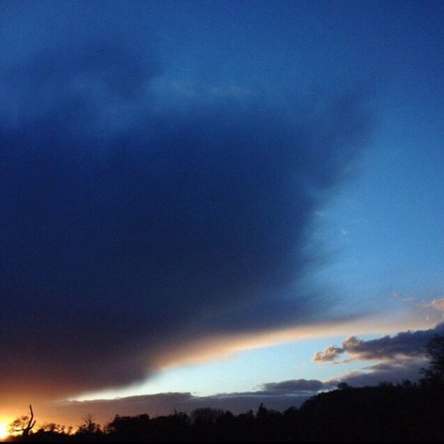 silhouette, sky, scenics, tranquil scene, beauty in nature, tranquility, sunset, cloud - sky, nature, blue, cloud, idyllic, landscape, dusk, low angle view, tree, dramatic sky, cloudy, outdoors, majestic