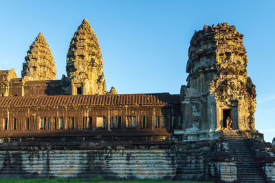 View of temple against clear blue sky