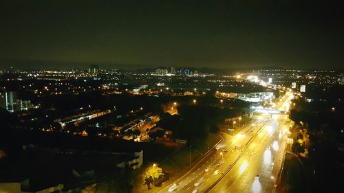 Aerial view of city at night