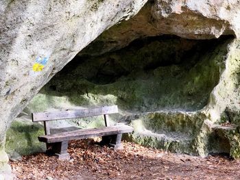 Old bench on rock