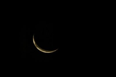 Close-up of moon over black background