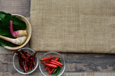 High angle view of chili peppers on table