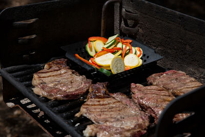 Close-up of meat on barbecue grill