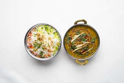 High angle view of food on table against white background