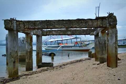 nautical vessel, transportation, boat, mode of transport, sea, moored, water, beach, sky, abandoned, sand, shore, damaged, wood - material, pier, obsolete, day, built structure, horizon over water, nature