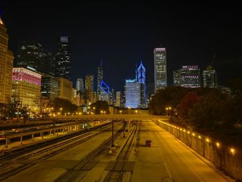Illuminated buildings in city at night
