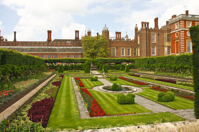 View of garden with buildings in background