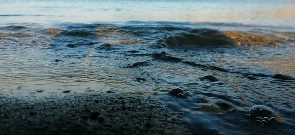 Close-up of sea waves at beach