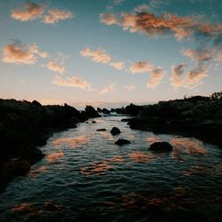 Scenic view of sea at sunset