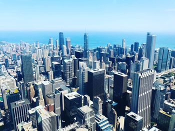 High angle view of city buildings against sky