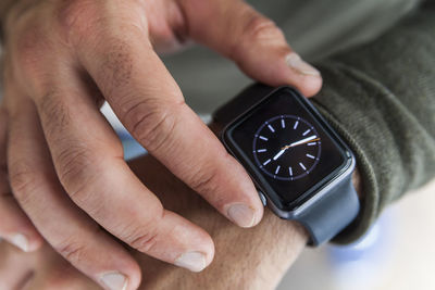 Businessman with smartwatch, close-up