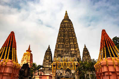 Mahabodhi temple buddhist stupas isolated with bright sky and unique prospective