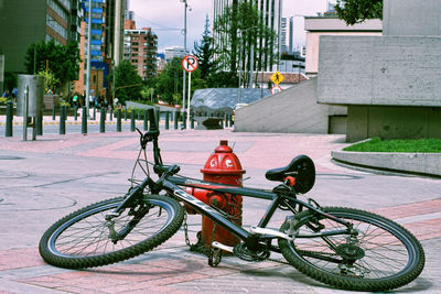 Bicycle parked in fire hydrant