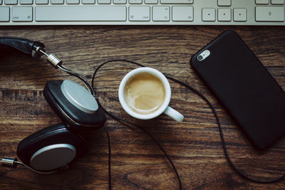 High angle view of coffee cup on table